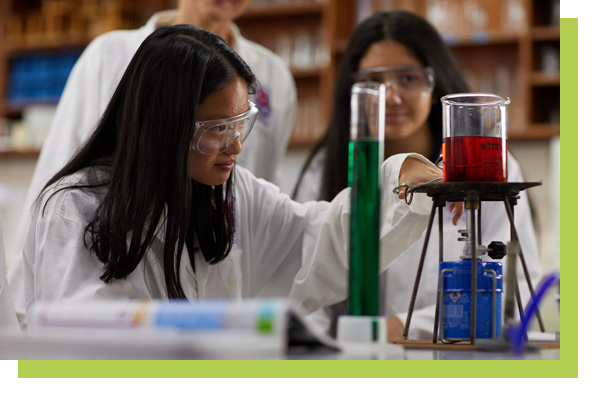 Student using laboratory equipment in the classroom