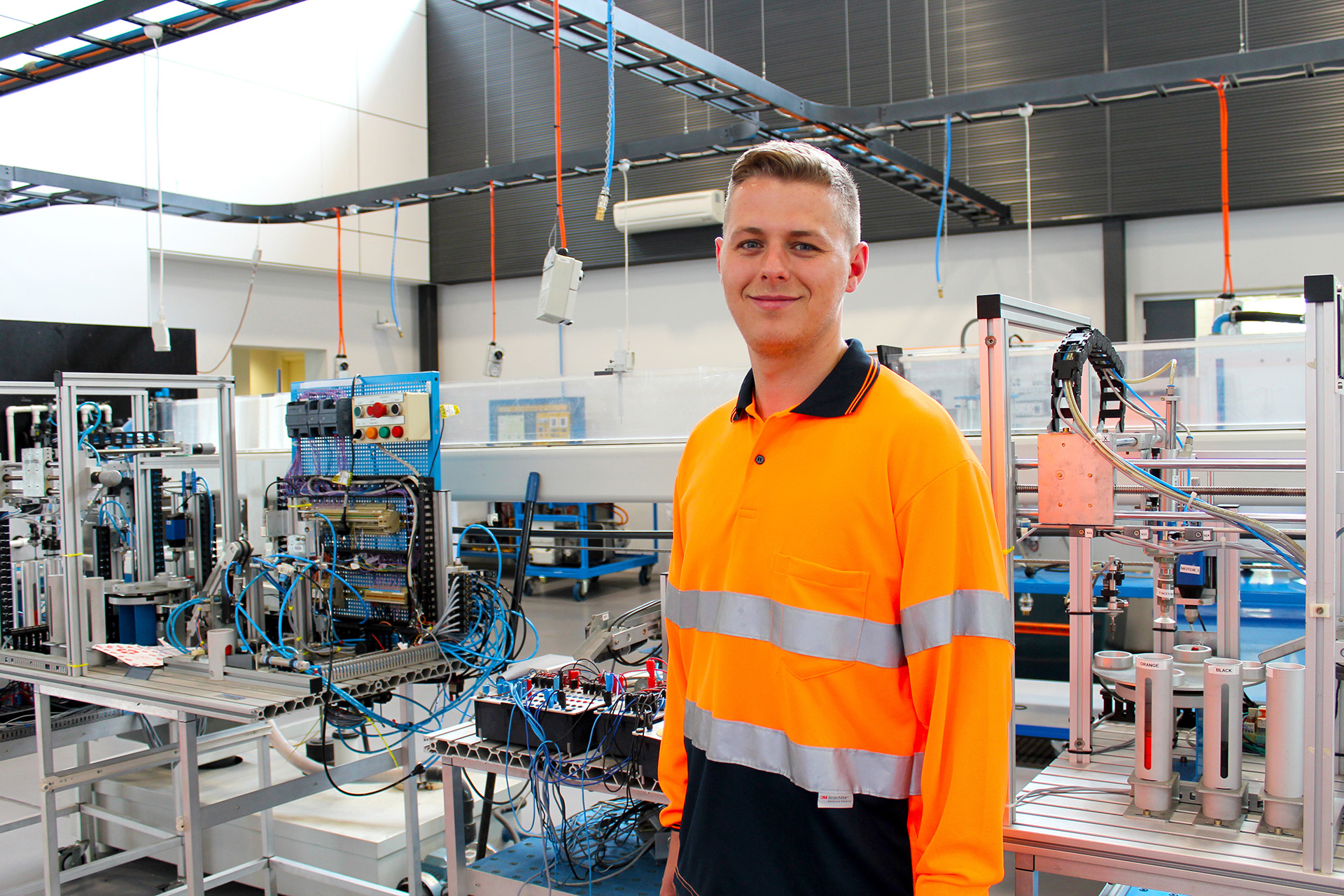 student in engineering workspace