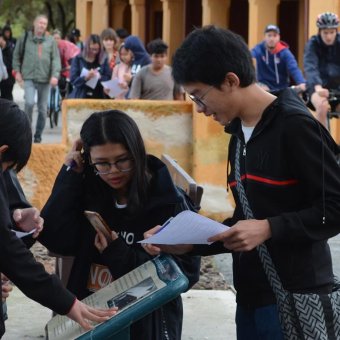 Group of students reading a map sign on Rottnest Island