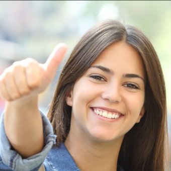 Student giving a thumbs up
