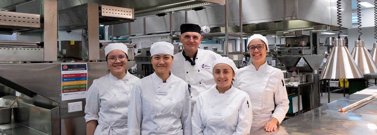 Lecturer and TAFE Hospitality students at Bentley Pines Restaurant kitchen