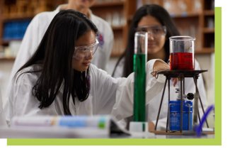 Student using laboratory equipment in the classroom