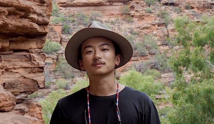 Student Masahiro in rocky landscape, regional Western Australia