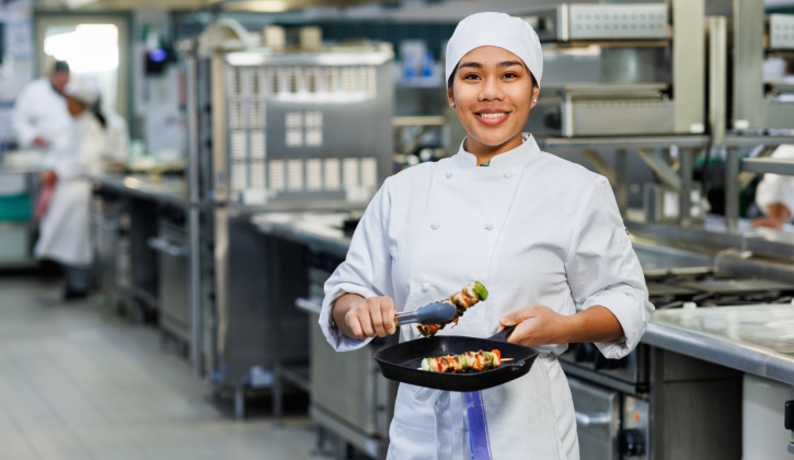 Commercial Cookery Student in kitchen
