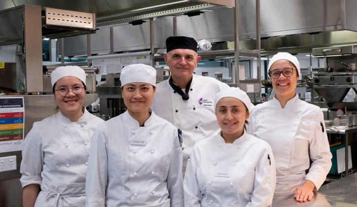 Lecturer and TAFE Hospitality students at Bentley Pines Restaurant kitchen