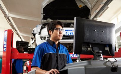 Student working with automotive training equipment at Carlisle campus