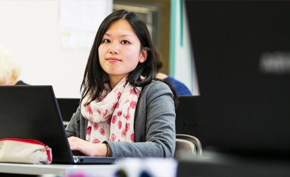 Woman using laptop computer