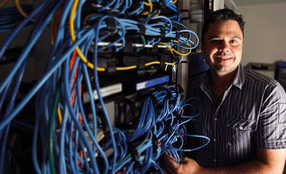 Person working with network cables