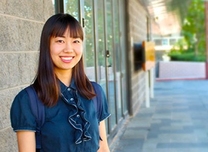 Kiko, a TAFE student stands outside the Northbridge TAFE campus building