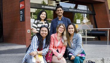 Group of students out front of NMTAFE campus