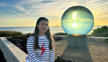 TIWA student Kate, standing in front of Geraldton beach