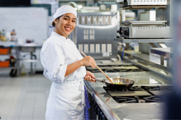 Commercial Cookery Student in kitchen