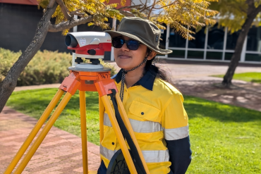 Civil and structural design student in field